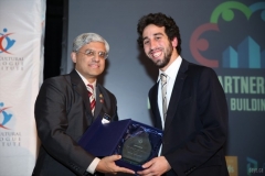 Danny-Richmond-receives-Emerging-Young-Leaders-Award-from-MPP-Shafiq-Qaadri